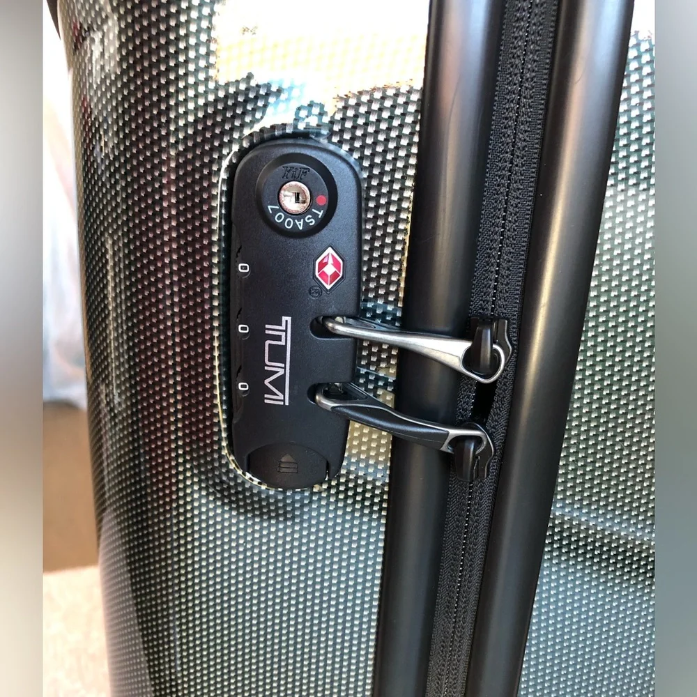 Tumi Metallic Carbon Fiber-Pattern Carry-On with Tan Leather Accent hunter green